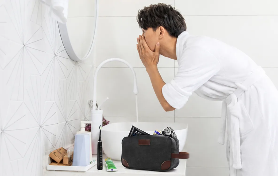 black canvas toiletry bag bathroom scene